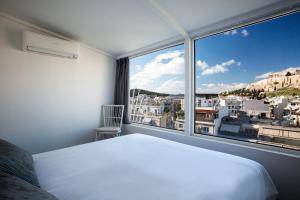 Posteľ alebo postele v izbe v ubytovaní Bright Apartment with Stunning Acropolis Views! SG5