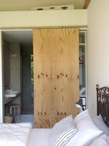 Postel nebo postele na pokoji v ubytování Corte Villa Donati