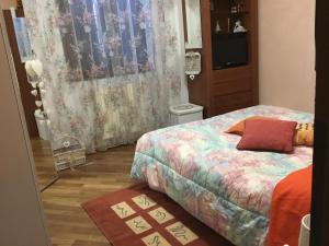 Un pat sau paturi într-o cameră la La Stellina