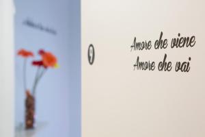 a picture of a vase with a vase with flowers at Foresteria Boccadasse in Genoa