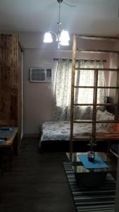 Katil atau katil-katil dalam bilik di The Treehouse A @ Trees Residences