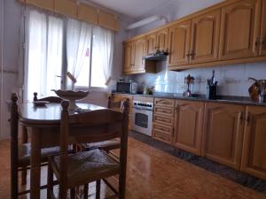 Kuchyň nebo kuchyňský kout v ubytování Casa Hormazas