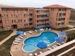 The swimming pool at or close to Sunny Day 6