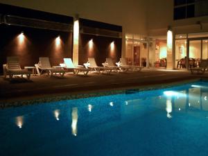 Bazén v ubytování Hotel Safari nebo v jeho okolí
