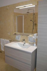 Kylpyhuone majoituspaikassa Le Grigne Guest House
