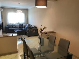 Χώρος καθιστικού στο Résidence les Ambassadeurs