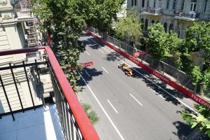 an aerial view of a street with a taxi at SAHIL Hostel & Hotel in Baku