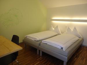 Letto o letti in una camera di Hotel Alte Gärtnerei