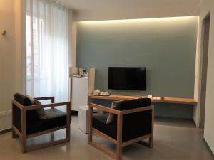 TV a/nebo společenská místnost v ubytování Da Baranin B&B and Apartment