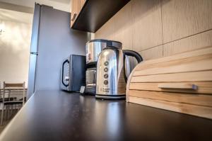 a coffee maker sitting on a counter in a kitchen at Hotel Elisabeta in Bucharest