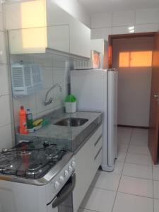 Apartamento Ponta Verde - SOHO tesisinde mutfak veya mini mutfak
