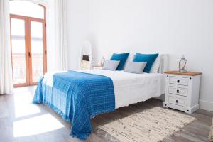 Uma cama ou camas num quarto em Dream Residence