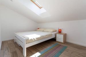 Cama o camas de una habitación en Apartments Beach House Villa