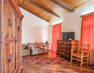 TV a/nebo společenská místnost v ubytování Hotel Mirhav