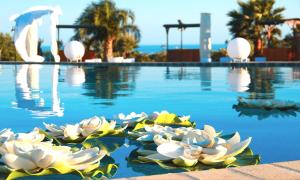 Bazén v ubytování Desusino Residence & Hotel nebo v jeho okolí