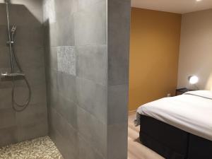 Kylpyhuone majoituspaikassa LA GRANGE D'ELISA