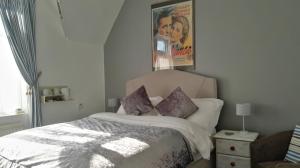 A bed or beds in a room at Blue Palms 