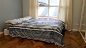 Postel nebo postele na pokoji v ubytování Abbotsford Private Rooms & Pods - 15 Charles Homestay