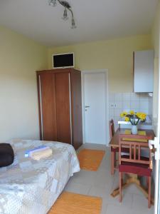 Postel nebo postele na pokoji v ubytování Apartments Frakić