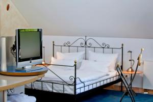 Postel nebo postele na pokoji v ubytování Hotel Watthalden