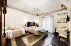 A bed or beds in a room at Sabbinirica