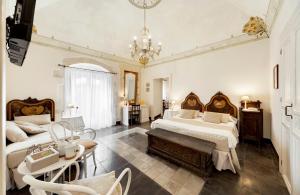 A bed or beds in a room at Sabbinirica