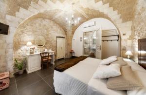 A bed or beds in a room at Sabbinirica