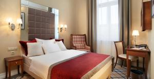 Posteľ alebo postele v izbe v ubytovaní Mirage Medic Hotel