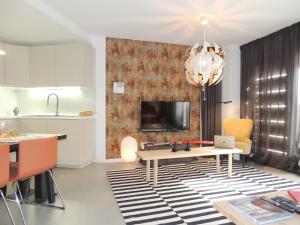 A television and/or entertainment centre at Casa Rincón Medanero