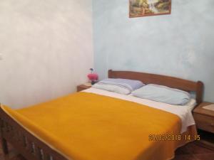 Ein Bett oder Betten in einem Zimmer der Unterkunft Villa Nada