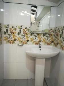 Koupelna v ubytování Hotel Sandara