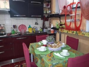 Kuchyň nebo kuchyňský kout v ubytování Casa in Fiera