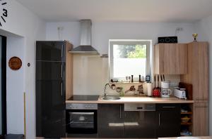 Kuchyň nebo kuchyňský kout v ubytování Ferienhaus "Am Gutspark"