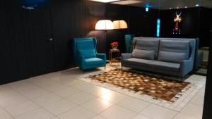 Area soggiorno di A casa Hotel