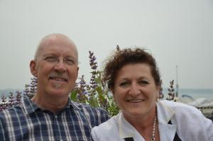a man and a woman posing for a picture at Affittacamere Porticciolo in Castelnuovo del Garda
