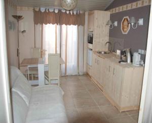 Η κουζίνα ή μικρή κουζίνα στο B&B Villa Viva Vitale