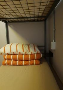 Postel nebo postele na pokoji v ubytování K Guesthouse