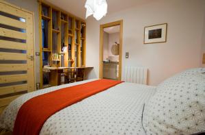 מיטה או מיטות בחדר ב-Gite urbain AU 2BIS - Annecy