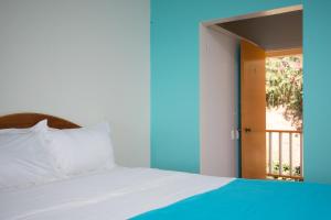 Bird Rock Beach Hotel客房内的一张或多张床位