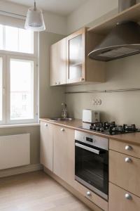 Kuchyň nebo kuchyňský kout v ubytování Allika Apartments
