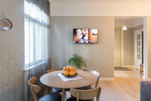 TV a/nebo společenská místnost v ubytování Allika Apartments