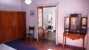 Łóżko lub łóżka w pokoju w obiekcie La Placeta, en Los Llanos