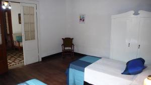 Łóżko lub łóżka w pokoju w obiekcie La Placeta, en Los Llanos