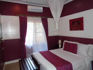 Letto o letti in una camera di The Clarice House
