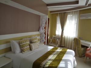 Letto o letti in una camera di The Clarice House