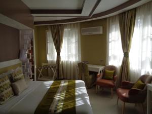 Letto o letti in una camera di The Clarice House