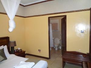 Letto o letti in una camera di The Clarice House