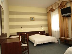 Кровать или кровати в номере Hotel Relaks