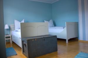 Ein Bett oder Betten in einem Zimmer der Unterkunft Stadtflucht Lüneburg: Ferienwohnungen Innenstadt