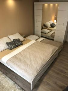Postel nebo postele na pokoji v ubytování Apartmán U Zlaté hroudy